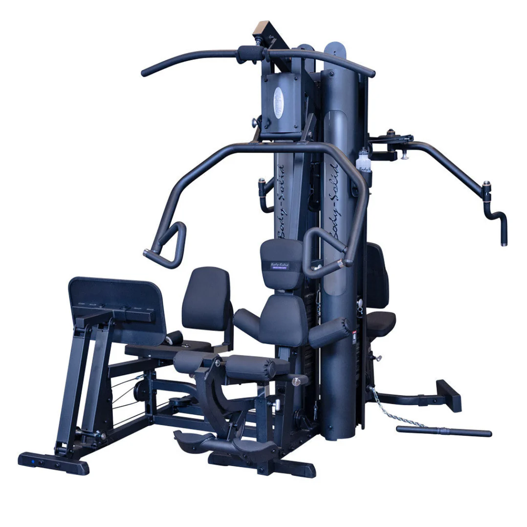 All-in-one home gym machine with leg press, cable stations, and weight stack
